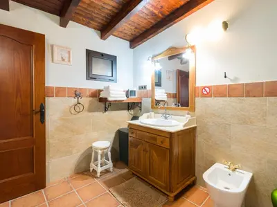 Un baño de Sombra del Laurel