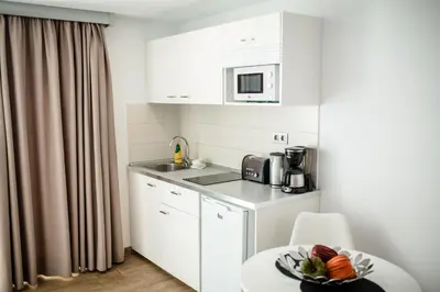 Una cocina o zona de cocina en IG Nachosol Premium Apartments by Servatur (Adults Only)