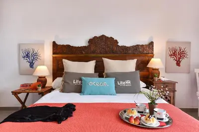 Cama o camas de una habitación en Agaete Beach Rental at Volcanic Natural Pools by VillaGranCanaria