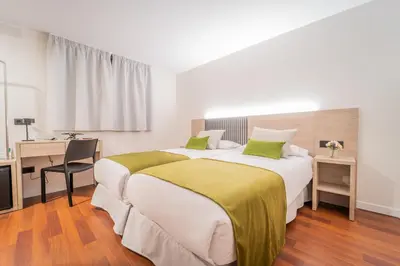 Cama o camas de una habitación en SAHERA HOTEL Boutique