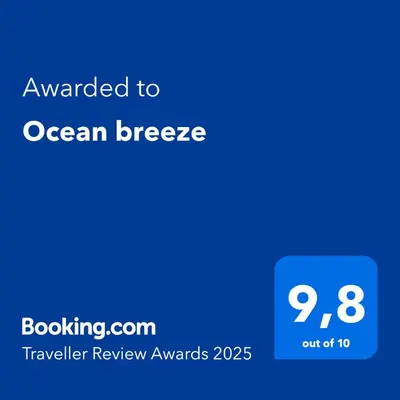 Certificado, premio, señal o documento que está expuesto en Ocean breeze