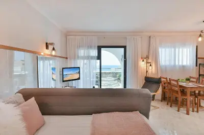 Una televisión o centro de entretenimiento en Los Canarios 122 by VillaGranCanaria