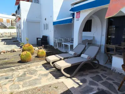 Zona de estar de Los Canarios 122 by VillaGranCanaria