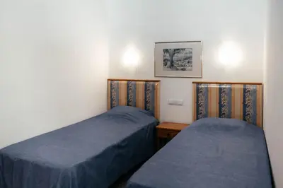 Cama o camas de una habitación en Apartamento Tamaravista 2