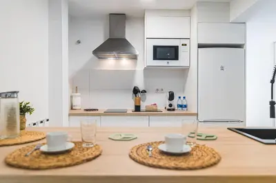 Una cocina o zona de cocina en Home2Book Las Canteras Beach House