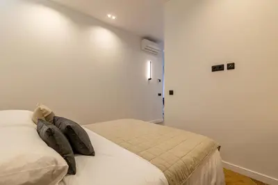 Cama o camas de una habitación en Las Canteras Beach Folks