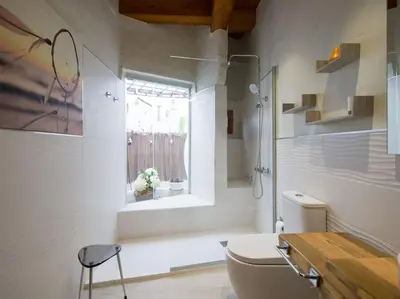 Un baño de Sunset Banana Plantation House with sea views and private pool by CanaryScape