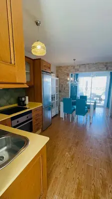 Una cocina o zona de cocina en Dúplex Vista Dorada 64