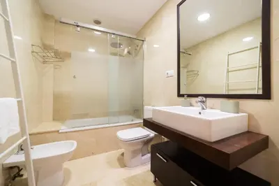 Un baño de Sand Beach Las Canteras