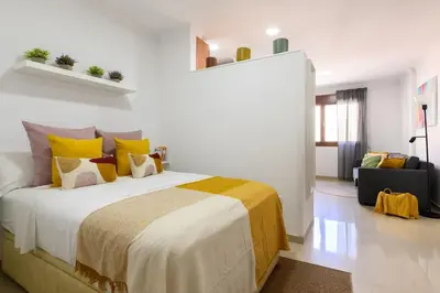 Cama o camas de una habitación en Private Parking included Dream Gravina Studio