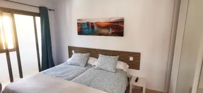 Cama o camas de una habitación en Arinaga Beach Gran Canaria