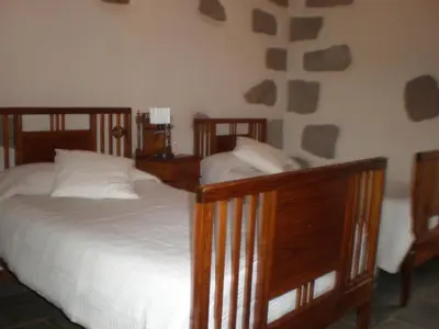 Cama o camas de una habitación en Casa Rural Las Caldereras