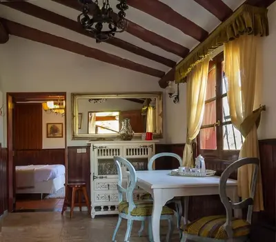 Cama o camas de una habitación en CASA RÚSTICA CON JACUZZI