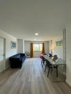 Zona de estar de CoLiving El Juanito