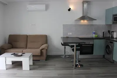 Una cocina o zona de cocina en VV Alcaravaneras Ático A