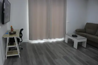 Una televisión o centro de entretenimiento en VV Alcaravaneras Ático A