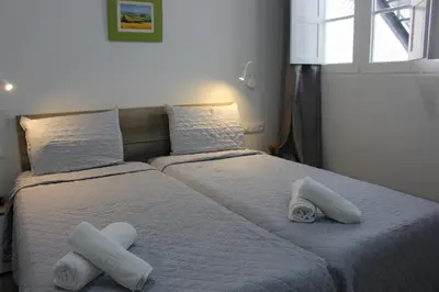Cama o camas de una habitación en VV Alcaravaneras Ático B