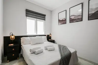 Cama o camas de una habitación en Flat Triana