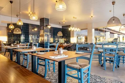 Un restaurante o sitio para comer en Sunwing Arguineguin Seafront