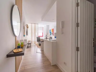 Una televisión o centro de entretenimiento en Fantástico estudio con ascensor Playa de Las Canteras BT3c