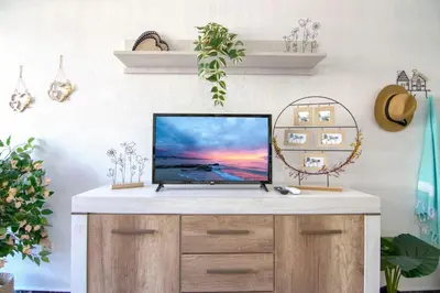 Una televisión o centro de entretenimiento en La Perla de Monterrey by Homestaygrancanaria
