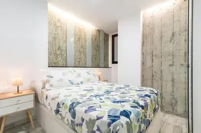 Cama o camas de una habitación en Home2Book Cozy Escape near Las Canteras Beach
