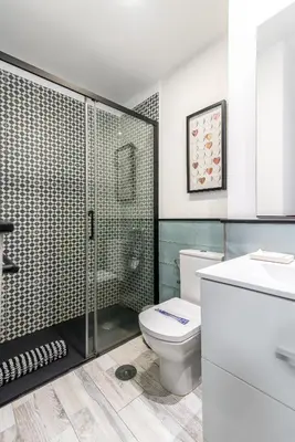 Un baño de Home2Book Cozy Escape near Las Canteras Beach