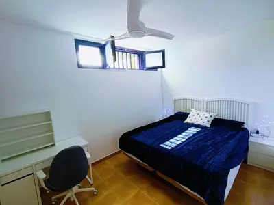 Cama o camas de una habitación en Luxury House with sea view, hottub & pool