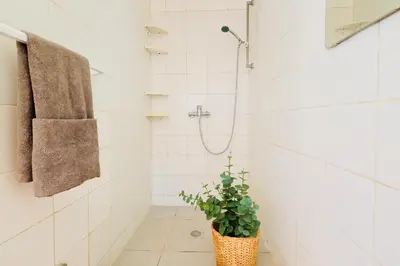 Un baño de Villa Ama Casa