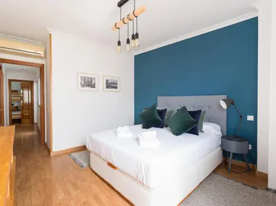 Cama o camas de una habitación en Moderno piso de 3 habitaciones cerca de Triana