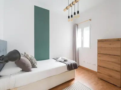 Cama o camas de una habitación en Moderno piso de 3 habitaciones cerca de Triana
