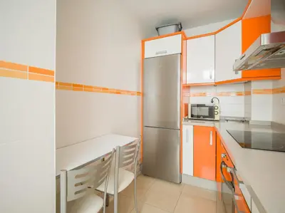 Una cocina o zona de cocina en Moderno piso de 3 habitaciones cerca de Triana