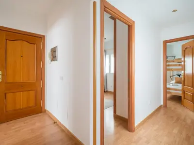 Cama o camas de una habitación en Moderno piso de 3 habitaciones cerca de Triana