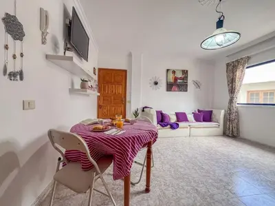 Una televisión o centro de entretenimiento en Apartamento céntrico en Agaete