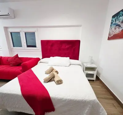 Cama o camas de una habitación en Alojamientos Agaete Pueblo Nº1 y Nº2