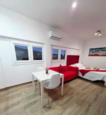 Cama o camas de una habitación en Alojamientos Agaete Pueblo Nº1 y Nº2