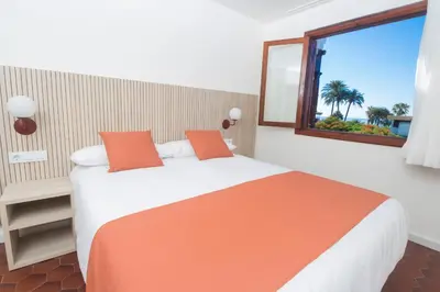 Cama o camas de una habitación en Alsol Las Orquídeas