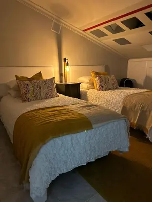 Cama o camas de una habitación en Basement Apartment