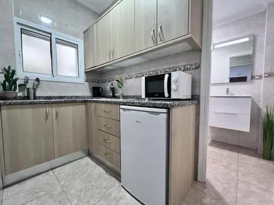Una cocina o zona de cocina en Riquiño-Estudio playa Canteras