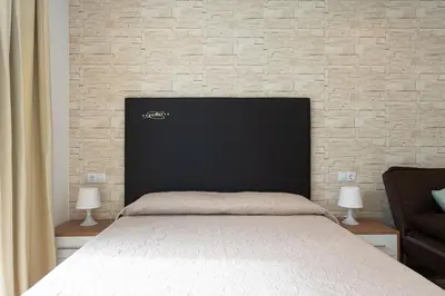 Cama o camas de una habitación en Estudio Westerling Las Canteras