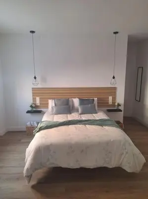 Cama o camas de una habitación en La esquina de Miguel