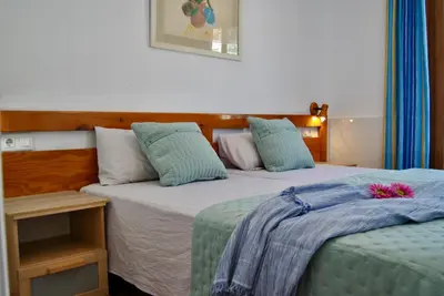 Cama o camas de una habitación en Montecarlo 35&45 first row with air conditioning & WI-FI & sound insulation