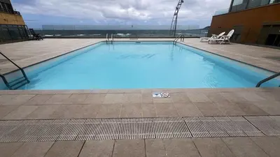 Piscina en o cerca de Vivienda vacacional en primera linea de playa y vistas al Mar y Piscina