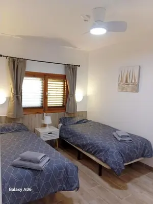 Cama o camas de una habitación en Cosy Upgraded - 1 Bedroom Apartment, Los Juncos
