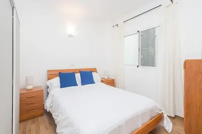 Cama o camas de una habitación en Estudio en primera línea de playa