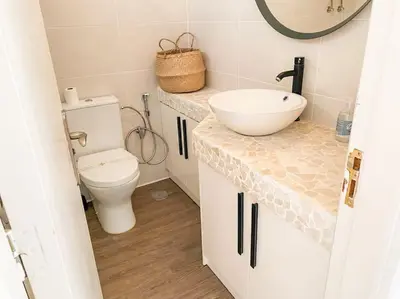 Un baño de Cozy apt pool&tennis