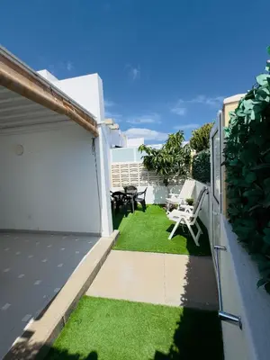 Jardín al aire libre en Bungalow Vista Dunas 32