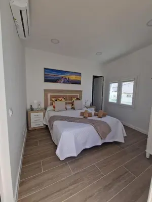 Cama o camas de una habitación en Alojamientos Agaete Pueblo Nº6