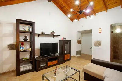Una televisión o centro de entretenimiento en Vv Casa Frasquita