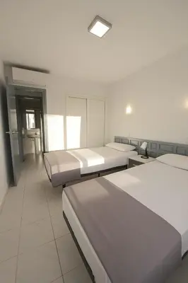 Cama o camas de una habitación en Beachfront Patalavaca